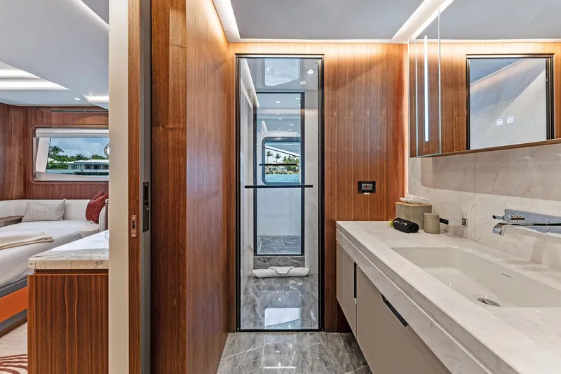 Slide: The Image of Luxurious interior of 2024 Aquitalia 78 Fly yacht with modern bathroom and wood accents. - 35