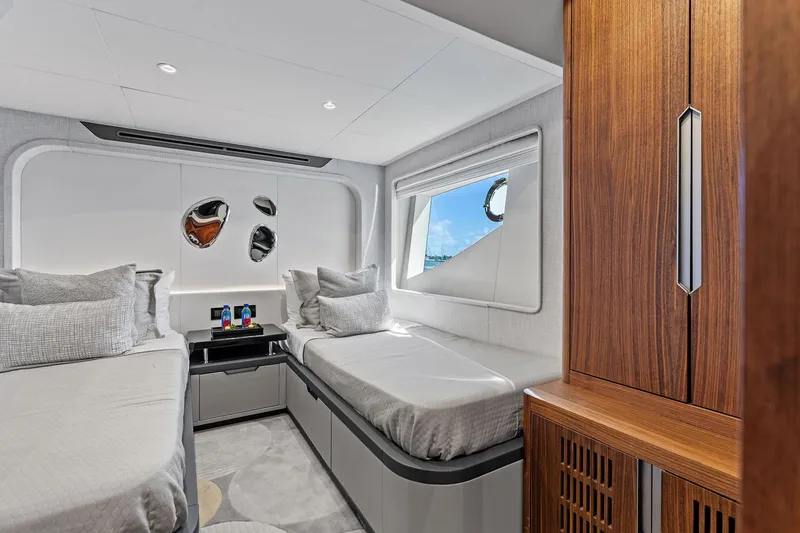 Slide: The Image of Luxurious cabin interior of 2024 Aquitalia 78 Fly yacht with twin beds and modern decor. - 43