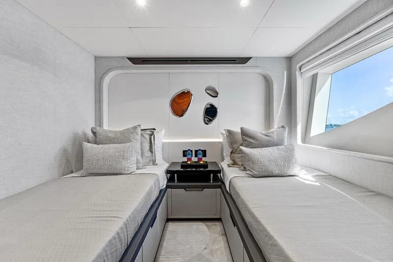 Slide: The Image of Luxurious twin cabin interior of 2024 Aquitalia 78 Fly yacht, featuring modern design and decor. - 44