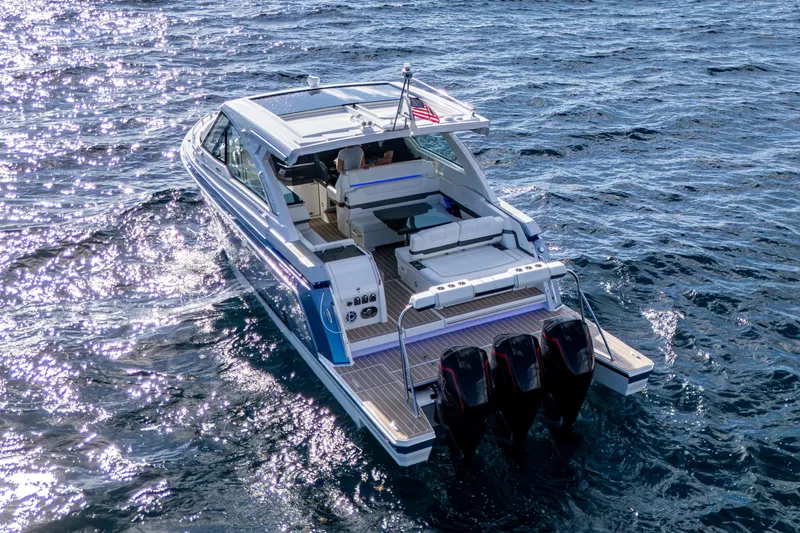 Slide: The Image of 2022 Formula 380 Super Sport Crossover OB cruising on open water. - 48