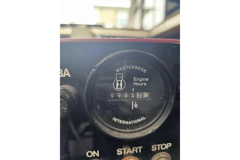 Slide: The Image of Westerbeke engine hour meter showing 9985.2 hours on a 1989 Sumerset 14x62. - 42