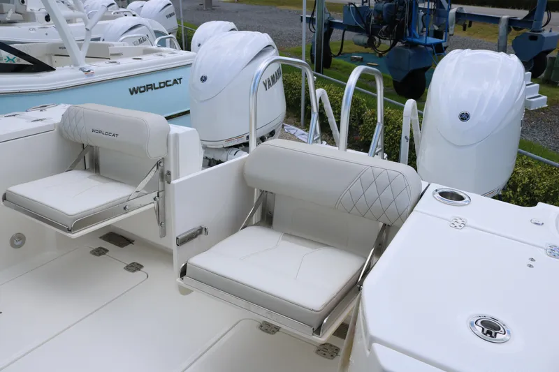 Slide: The Image of 2026 World Cat 265 CC-X boat with Yamaha engines and foldable seating. - 19