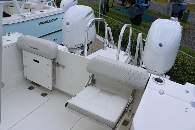 Slide: The Image of 2026 World Cat 265 CC-X boat interior with seating and dual outboard engines. - 20
