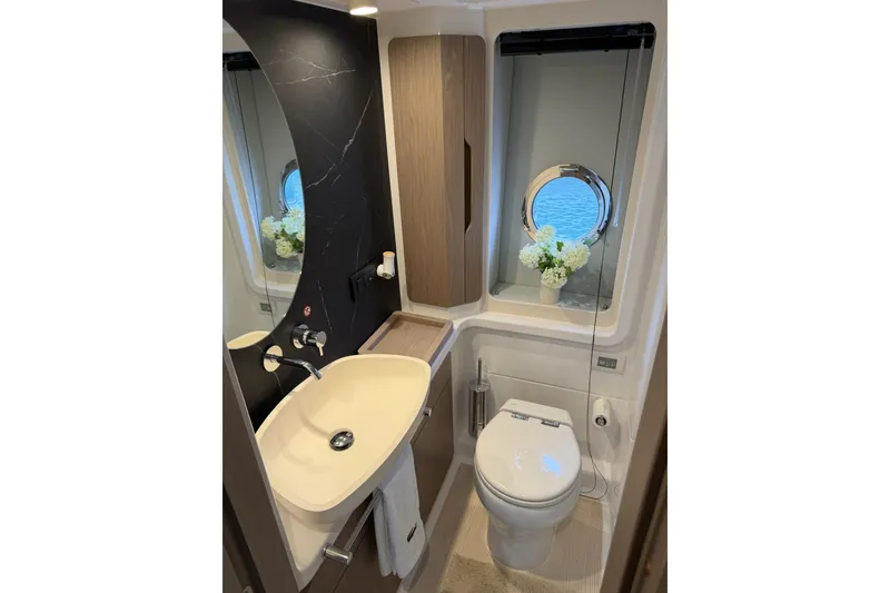 Slide: The Image of Luxurious bathroom in 2024 Azimut Fly 50 yacht with modern fixtures and ocean view. - 27