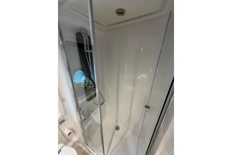 Slide: The Image of Luxurious shower in 2024 Azimut Fly 50 yacht, featuring sleek glass doors and modern fixtures. - 29