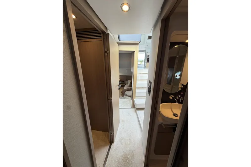 Slide: The Image of Interior hallway of 2024 Azimut Fly 50 yacht, featuring modern design and luxurious amenities. - 31