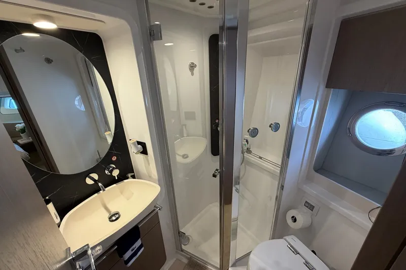 Slide: The Image of Luxurious bathroom in 2024 Azimut Fly 50 yacht, featuring modern fixtures and elegant design. - 33