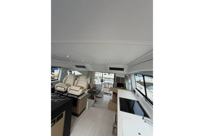 Slide: The Image of Luxurious interior of 2024 Azimut Fly 50 yacht with modern seating and sleek design. - 38