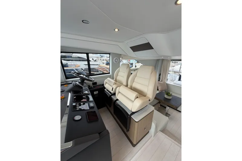 Slide: The Image of Luxurious interior of 2024 Azimut Fly 50 yacht with modern helm and plush seating. - 42