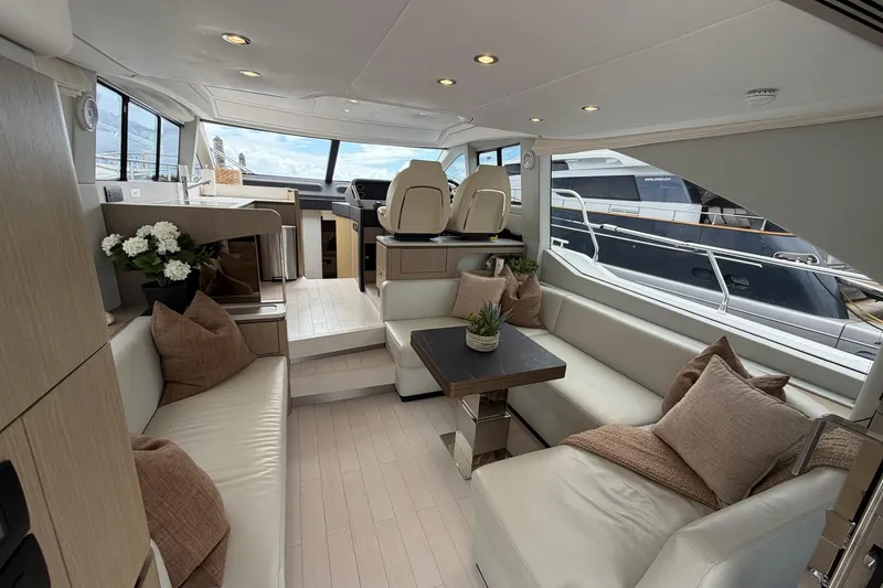 Slide: The Image of Luxurious interior of 2024 Azimut Fly 50 yacht with elegant seating and decor. - 47