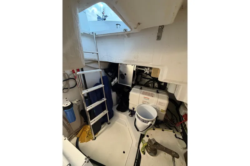 Slide: The Image of Interior view of 2024 Azimut Fly 50 yacht engine room with ladder and equipment. - 48