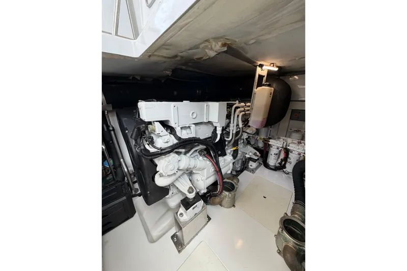 Slide: The Image of Engine room of 2024 Azimut Fly 50 yacht, showcasing mechanical components and systems. - 54
