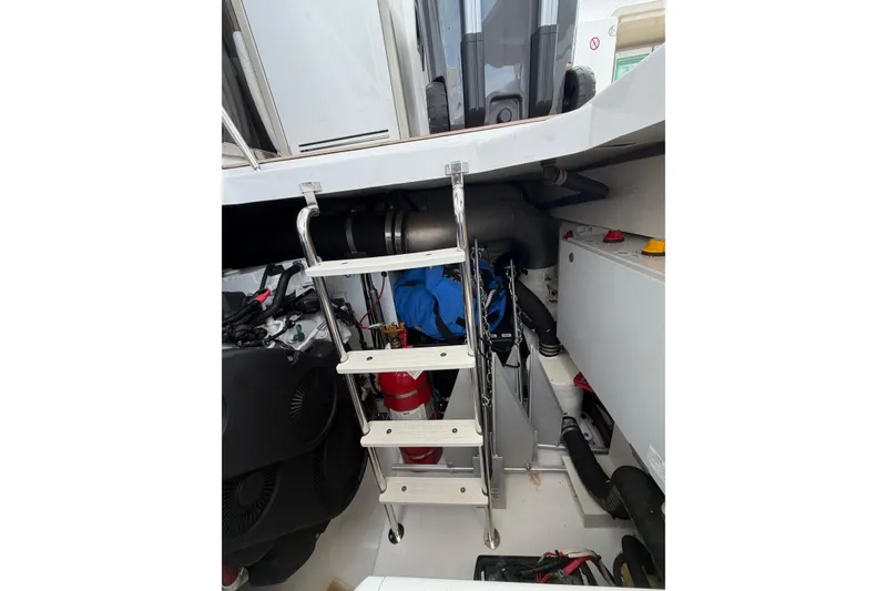 Slide: The Image of Engine room of 2024 Azimut Fly 50 yacht with ladder and equipment. - 57