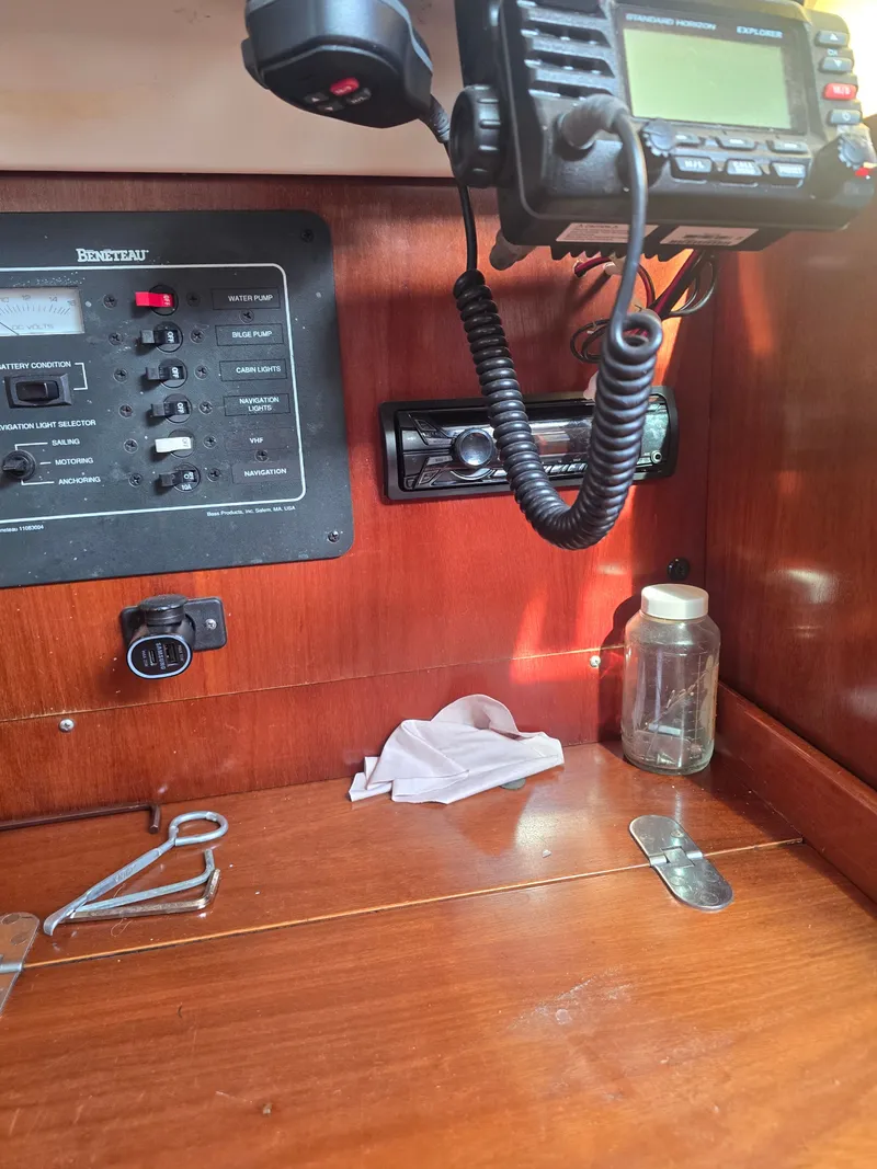 Slide: The Image of Beneteau First 265 1994 yacht control panel and radio. - 16