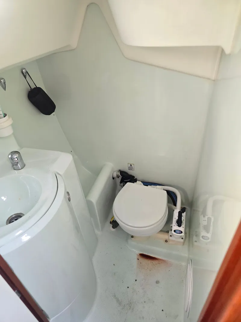 Slide: The Image of Bathroom in 1994 Beneteau First 265 sailboat. - 19