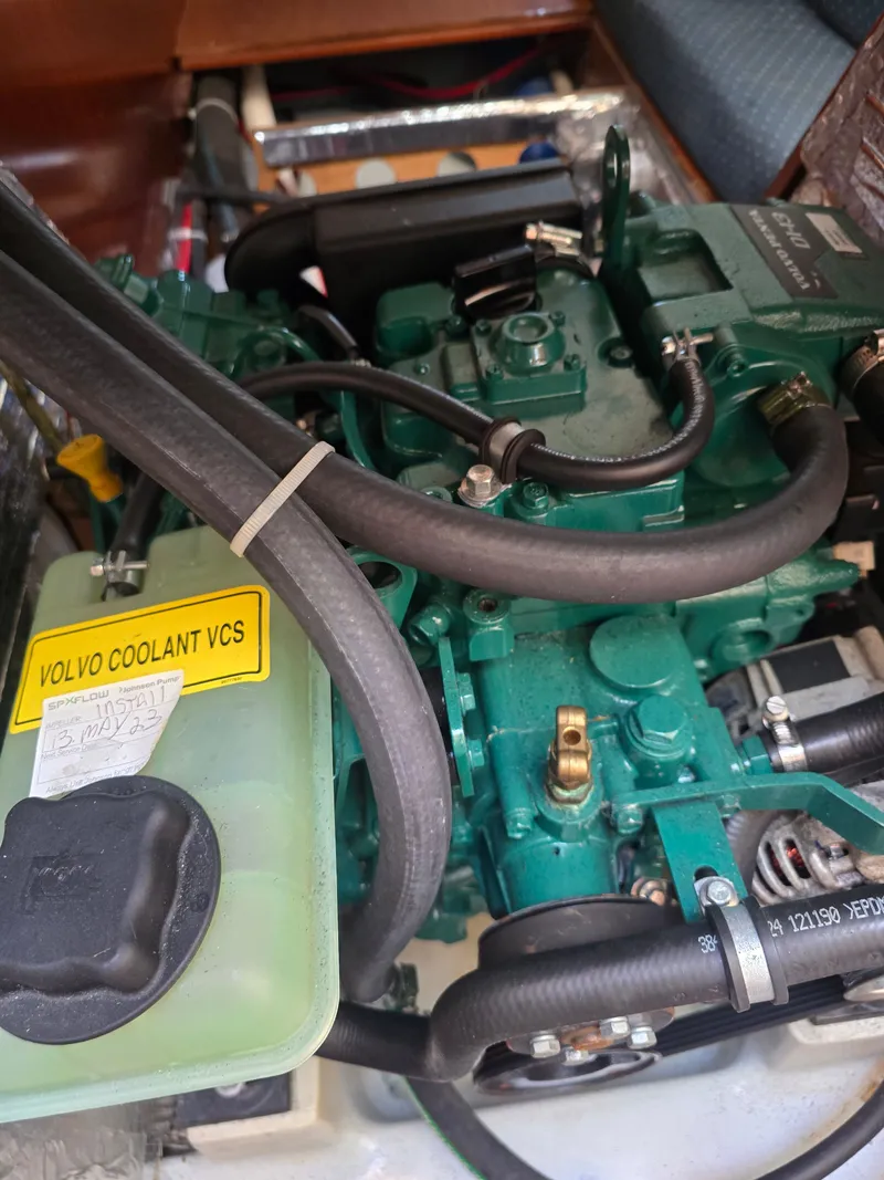 Slide: The Image of Engine compartment of a 1994 Beneteau First 265 with Volvo coolant. - 20