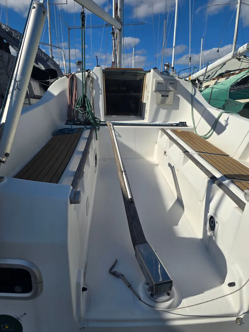 Slide: The Image of Cockpit of a 1994 Beneteau First 265 sailboat in harbor. - 5