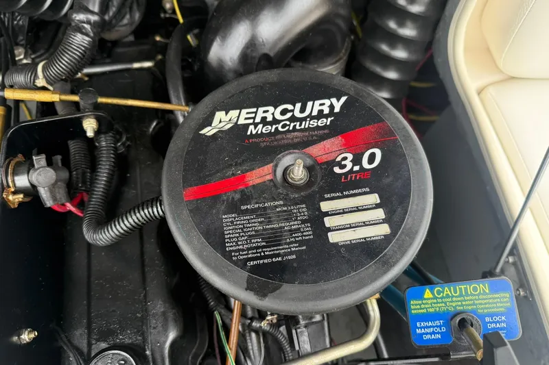 Slide: The Image of Mercury MerCruiser 3.0L engine in a 2003 Bayliner 185 boat, detailed view. - 13
