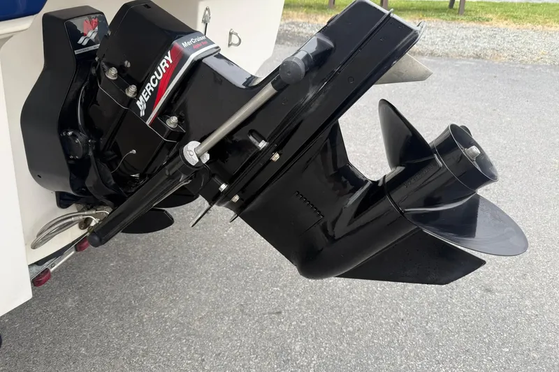 Slide: The Image of 2003 Bayliner 185 boat with Mercury MerCruiser Alpha One outdrive, close-up view. - 4