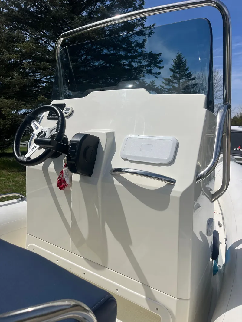 Slide: The Image of Steering console of Brig Navigator 570 boat, year 2022. - 7