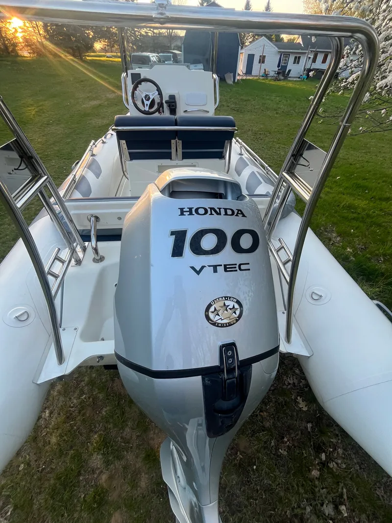 Slide: The Image of 2022 Brig Navigator 570 with Honda 100 VTEC engine on grass. - 9