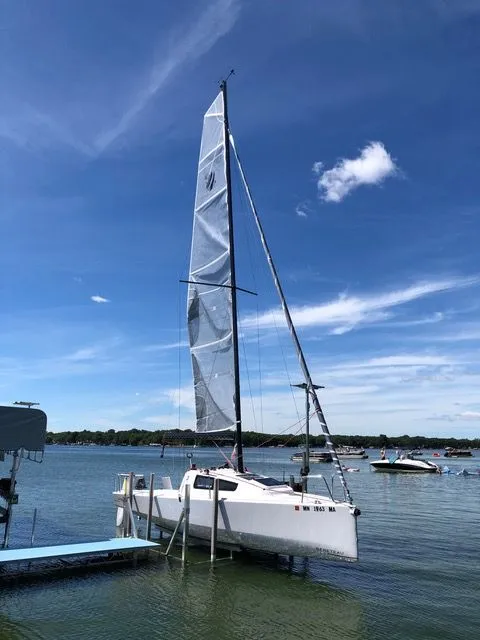 The Image of 2021 Beneteau First 24 sailboat docked on a sunny day. - 0