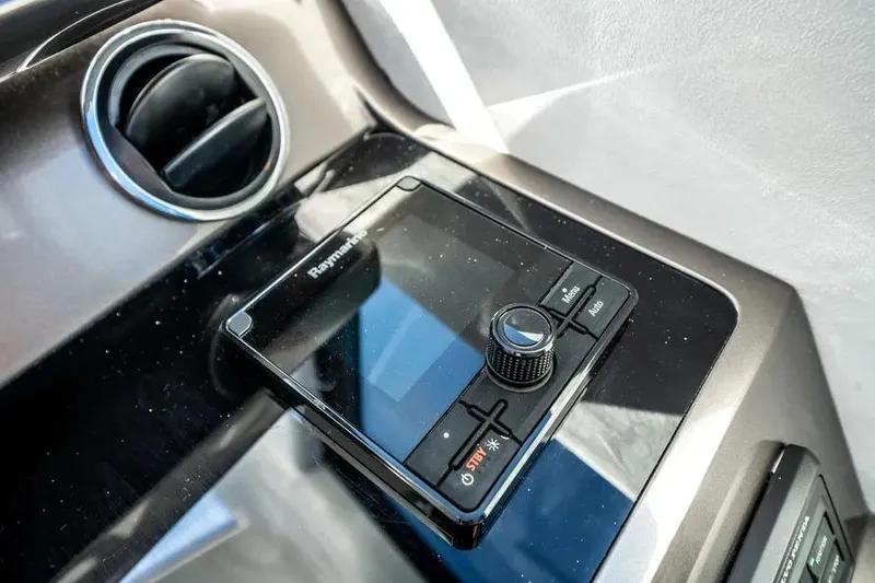 Slide: The Image of Control panel of 2024 Galeon 500 Fly yacht, featuring Raymarine navigation system. - 32