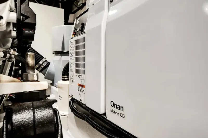 Slide: The Image of Engine room of 2024 Galeon 500 Fly featuring Onan Marine QD generator. - 51