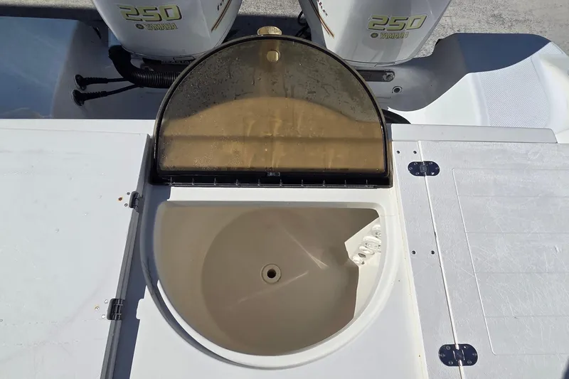 Slide: The Image of Open livewell on 2008 Key West 293 Center Console boat with Yamaha 250 engines. - 15