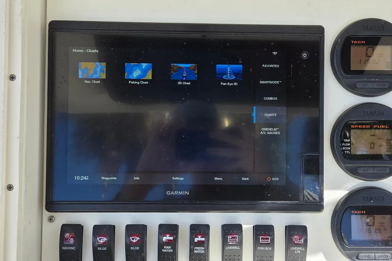 Slide: The Image of Garmin marine display on 2008 Key West 293 Center Console with Yamaha gauges and control switches. - 17