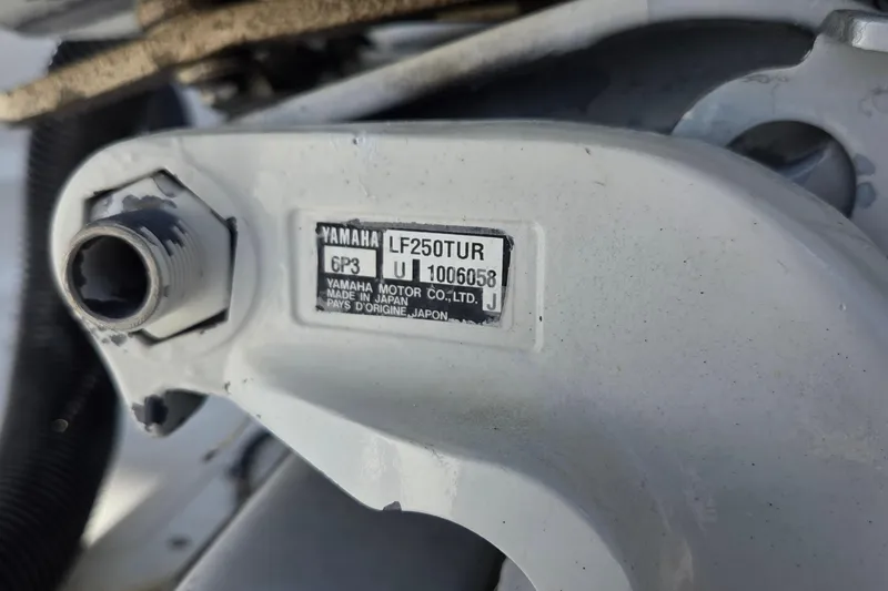 Slide: The Image of Close-up of Yamaha LF250TUR engine part on 2008 Key West 293 Center Console boat. - 21