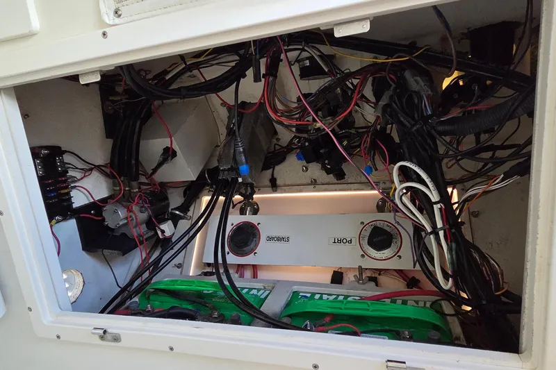 Slide: The Image of 2008 Key West 293 Center Console boat wiring and battery compartment. - 6