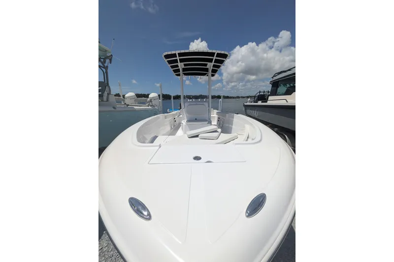 Slide: The Image of 2026 Clearwater 2000 Center Console boat on water with blue sky. - 5