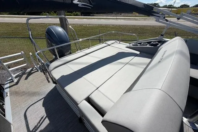 Slide: The Image of 2021 Bennington L22 boat with spacious seating and sleek design. - 16