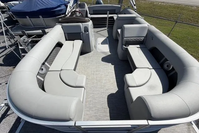 Slide: The Image of 2021 Bennington L22 pontoon boat interior with spacious seating and modern design. - 8