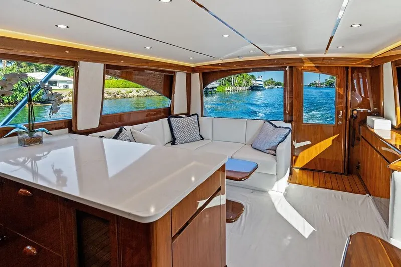 Slide: The Image of Luxurious interior of 2022 Viking 48 Convertible yacht with waterfront view. - 42