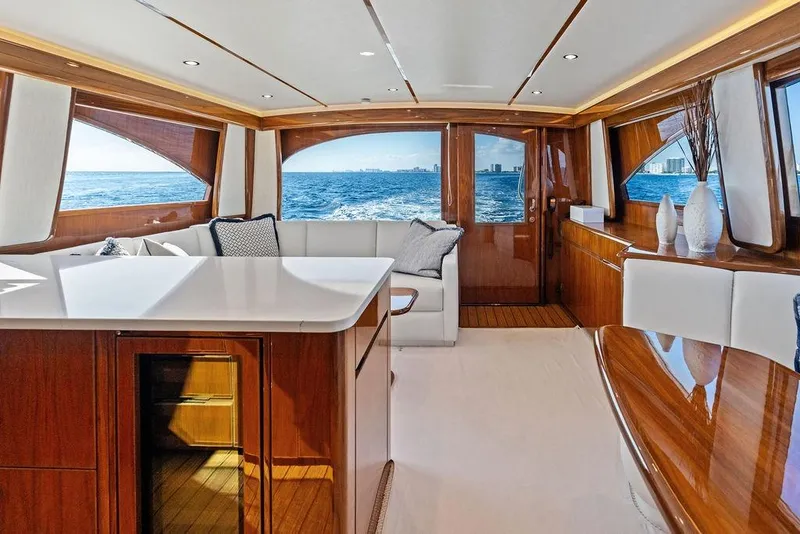Slide: The Image of Luxurious interior of 2022 Viking 48 Convertible yacht with ocean view. - 46