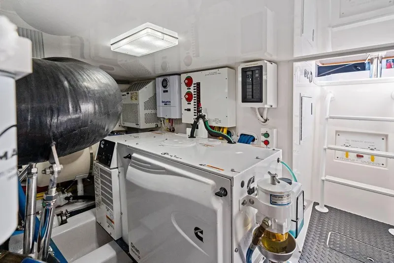 Slide: The Image of Engine room of 2022 Viking 48 Convertible yacht with modern equipment. - 70