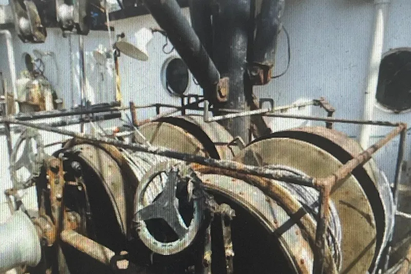 Slide: The Image of Rusty winches on a 1987 commercial freezer shrimp trawler deck. - 3