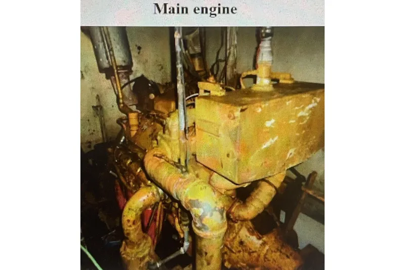 Slide: The Image of Main engine of 1987 Commercial Freezer Shrimp Trawler, showing rust and wear. - 4