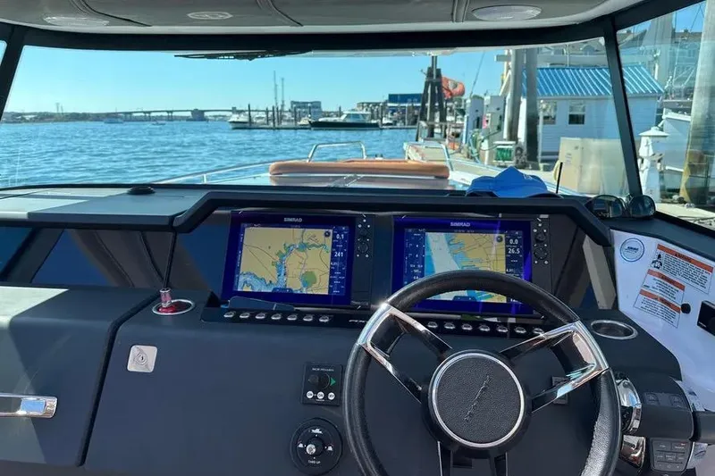Slide: The Image of 2022 Axopar 37 XC Cross Cabin helm with dual navigation screens - 6