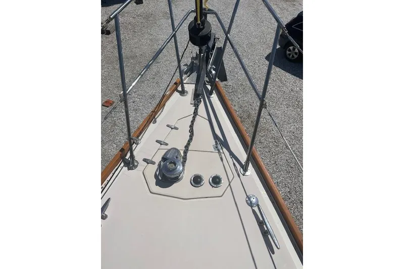Slide: The Image of Bow of a 1993 Sabre 38 sailboat with anchor chain and deck fittings. - 19