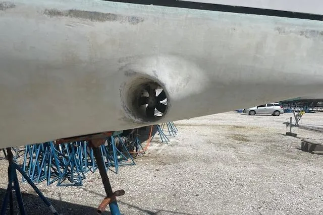 Slide: The Image of 1993 Sabre 38 sailboat hull with bow thruster in a boatyard. - 25