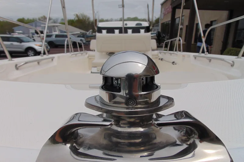 Slide: The Image of 2026 Boston Whaler 170 Montauk boat deck with chrome hardware detail. - 11