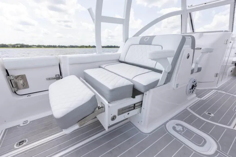 Slide: The Image of Manufacturer Provided Image: 2025 Sea Fox 288 Traveler boat interior with luxurious seating and modern design. - 8