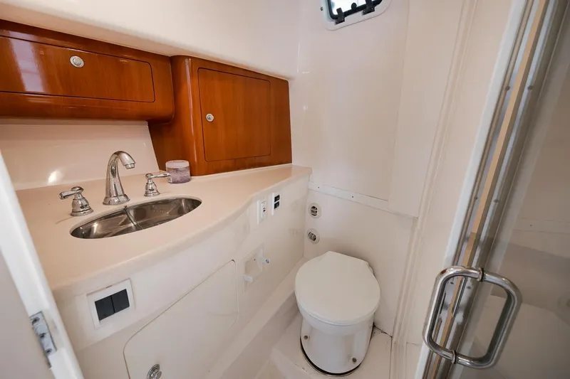 Slide: The Image of 2018 Intrepid 390 Sport Yacht deck with ocean view and safety equipment. - 42
