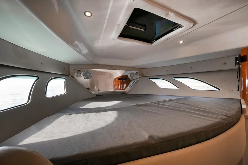 Slide: The Image of Interior cabin of 2018 Intrepid 390 Sport Yacht with sleek design and comfortable bedding. - 40
