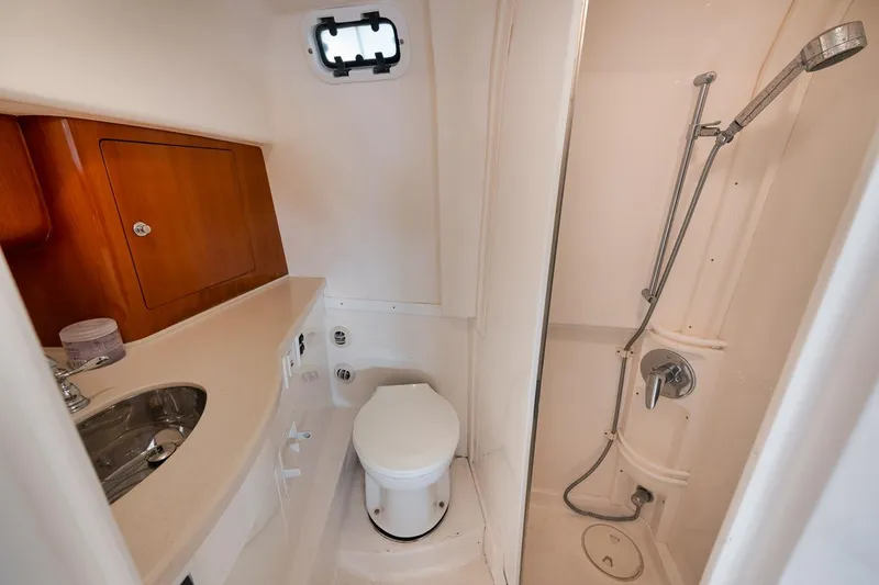 Slide: The Image of Bathroom interior of 2018 Intrepid 390 Sport Yacht with shower and sink. - 43