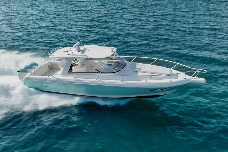 Slide: The Image of 2018 Intrepid 390 Sport Yacht cruising on open water. - 9