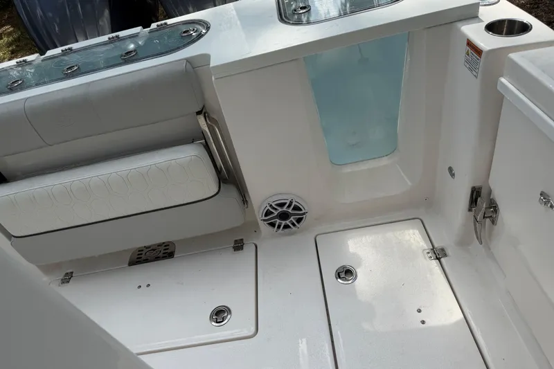 Slide: The Image of 2023 Sea Fox 288 Commander boat interior with seating and storage compartments. - 15